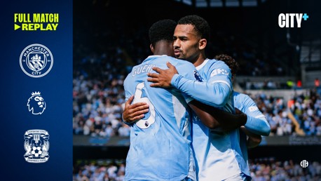 Manchester City players embrace on the field. Premier League and Coventry City Football Club logos are visible. Text reads 'FULL MATCH REPLAY' and 'CITY+'.