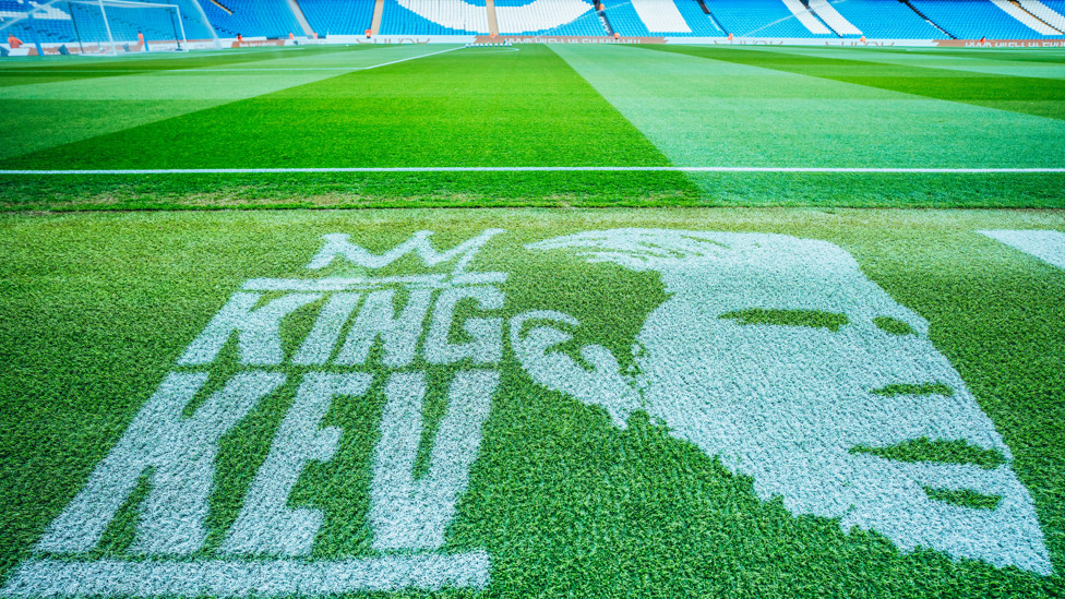 PITCH PORTRAIT : King Kev printed on the touchline ahead of the Belgian's final Etihad appearance.