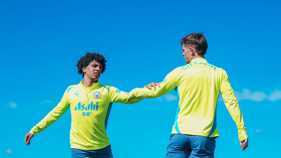 ACADEMY STARS : Rico Lewis and James McAtee get warmed up