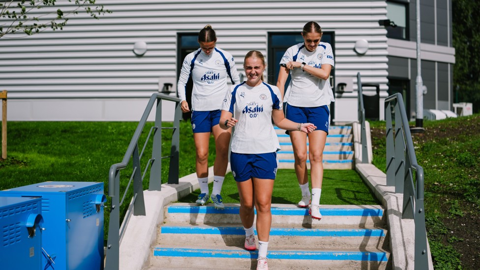 GETTING READY : The girls step out onto the pitch