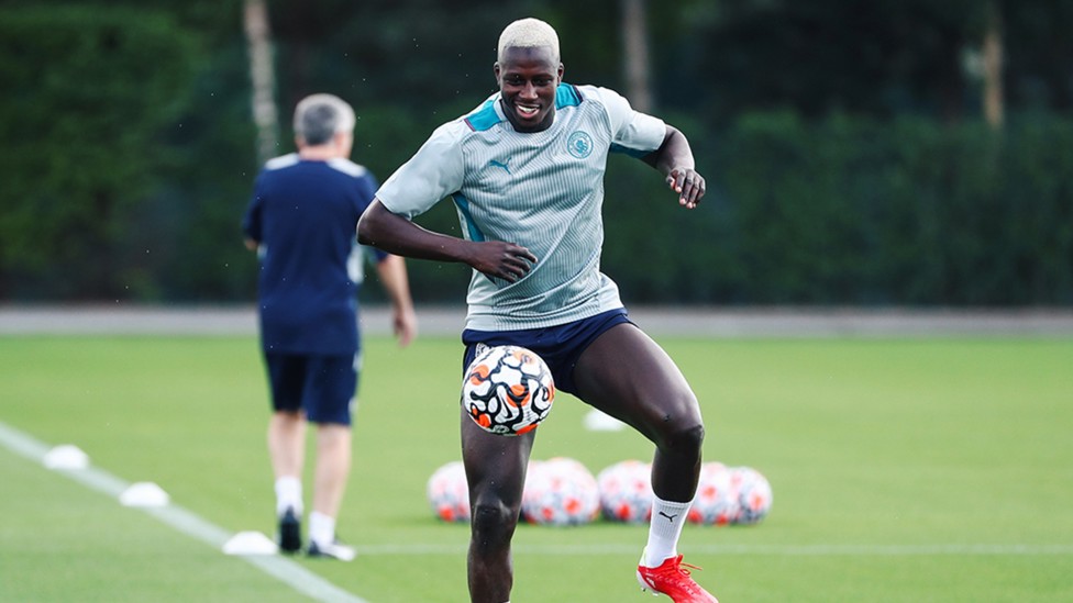 CLOSE CONTROL: Our left back brings the ball under control