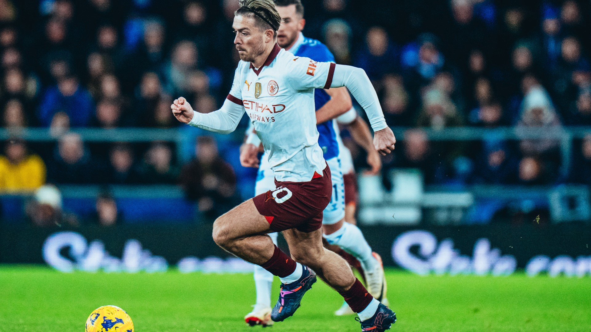 ACTION MAN: Jack Grealish drives forward for City.