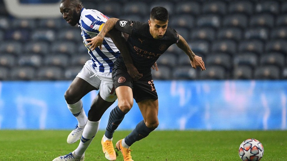 CANCELO'D OUT: Joao Cancelo shields possession from Moussa Marega