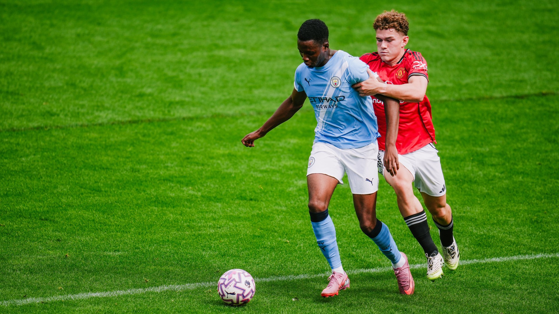 DERBY DAY BATTLE : Justin Oboavwoduo is put under pressure.