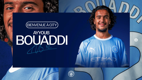 A promotional image welcoming Ayyoub Bouaddi to Manchester City. He is wearing the team's blue jersey, with the club's logo and text saying 'Welcome to City'.