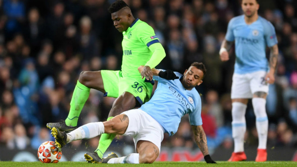 GETTING STUCK IN : Danilo tackles Breel Embolo during our Champions League Last 16 second leg win over Schalke