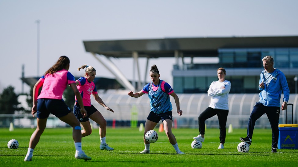 SURROUNDED : Lily Murphy searches for a team-mate