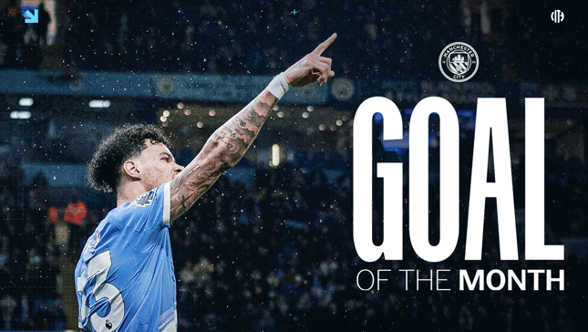 A football player wearing a Manchester City jersey points upwards in celebration of receiving the 'Goal of the Month' award. The Manchester City logo is visible in the background.