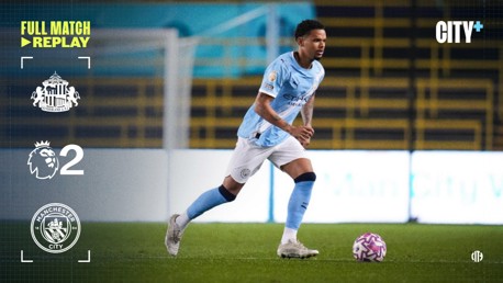 Image showing a Manchester City player in the club's light blue kit during a Premier League match replay against Sunderland AFC. The score is Sunderland 2, Manchester City 0. The image includes logos and text for City+.