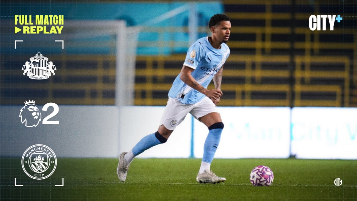 Image showing a Manchester City player in the club's light blue kit during a Premier League match replay against Sunderland AFC. The score is Sunderland 2, Manchester City 0. The image includes logos and text for City+.