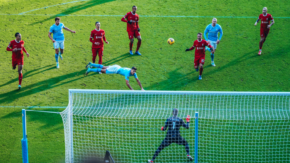 LEAPING RUBEN: Ruben Dias connects with a free kick, but it sails over the bar