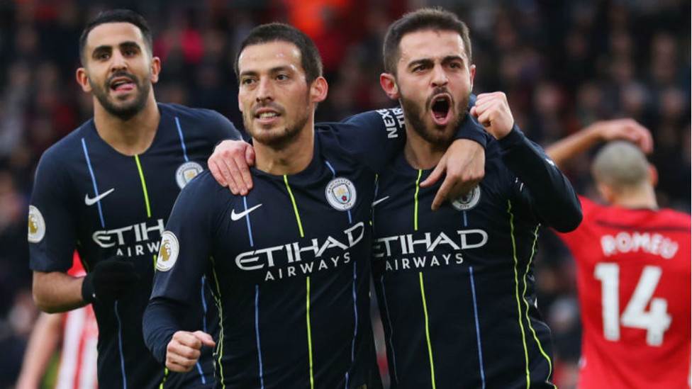 STARS ON SUNDAY : David Silva celebrates his early goal with Bernardo