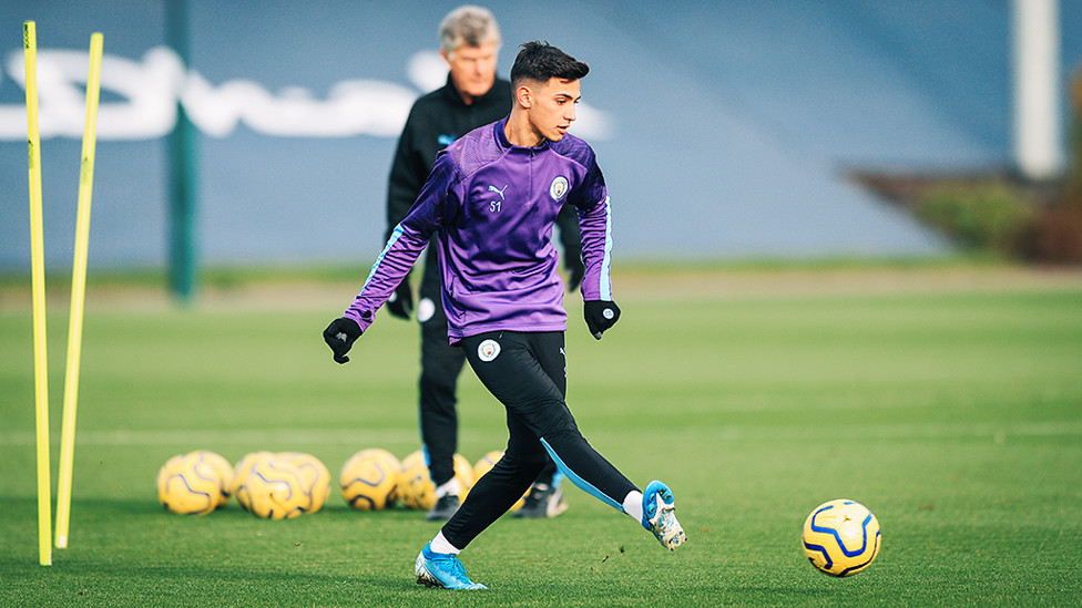 BY THE RIGHT : Nabil Touaizi works on his passing drills