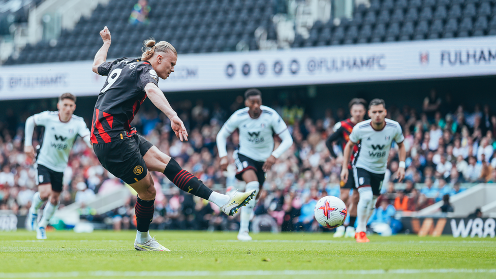 ON THE SPOT : Haaland strokes in from 12 yards!