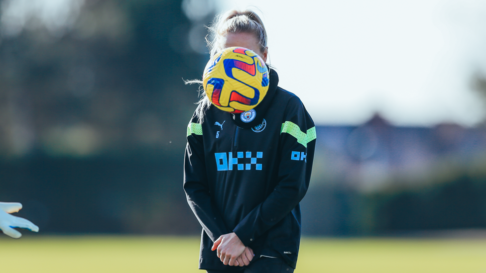 GUESS WHO : Alex Greenwood is masked by the ball