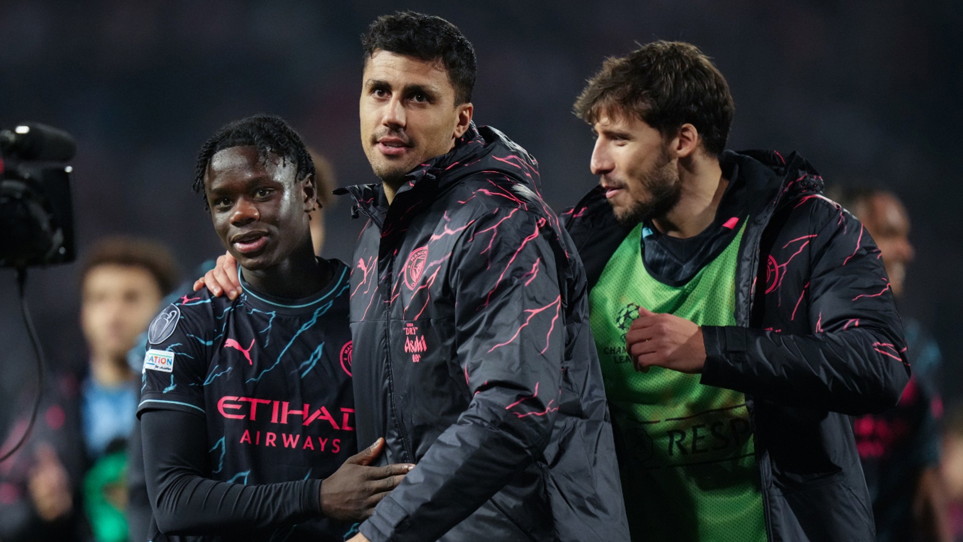 ALL SMILES: Rodrigo and Ruben Dias salute Mo after his impressive debut.