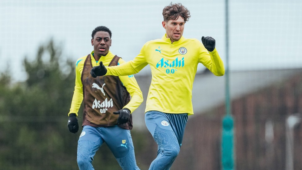 STEPPING OUT : John Stones brings the ball forward