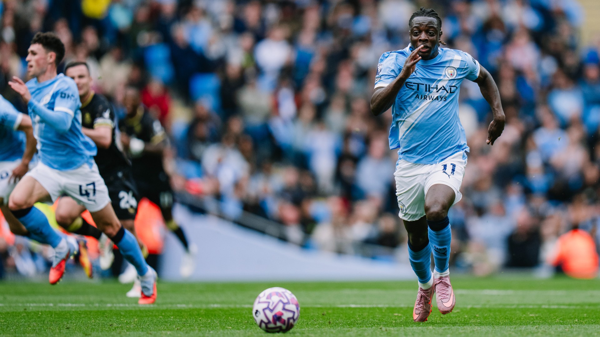 ACTION MAN: Jeremy Doku in the thick of things.