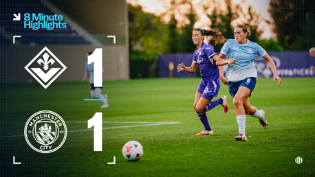 Image depicting Fiorentina vs Manchester City Women's team match with a score of 1-1. Two players from opposing teams are running along with a ball on the field.