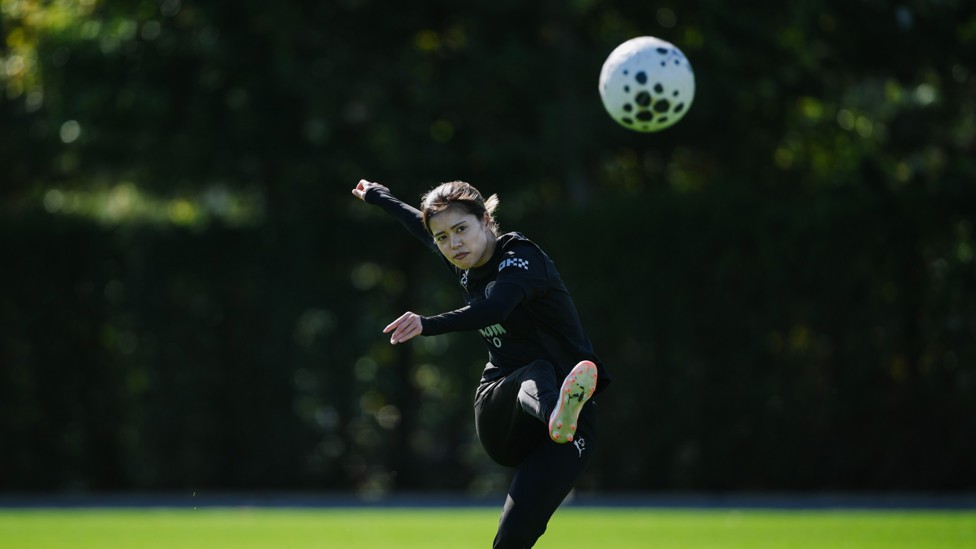 STRIKE : Yui Hasegawa puts her foot through the ball