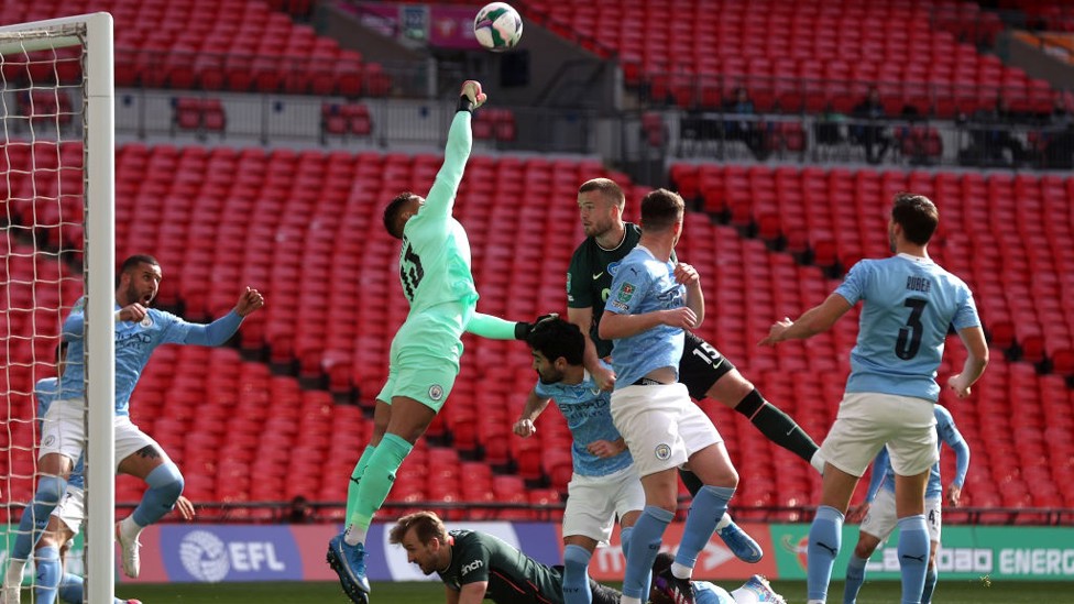 STEF-FIST : Our goalkeeper commands his area and punches the ball clear.