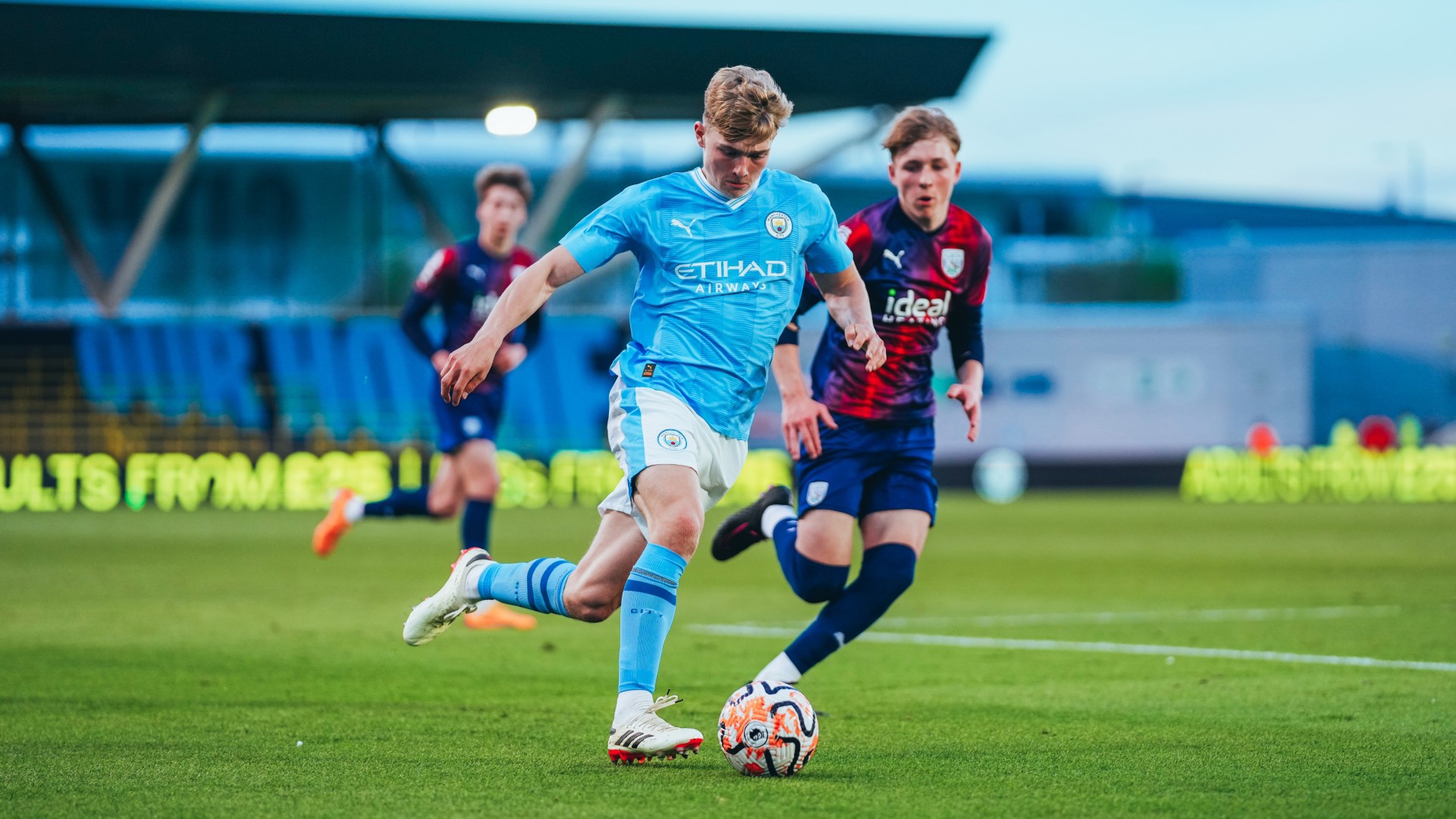 UNDER PRESSURE : Kian Breckin looked to break away from the West Brom press. 
