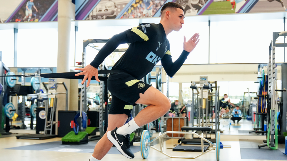 STRIKE A POSE : Phil Foden is put through his paces 