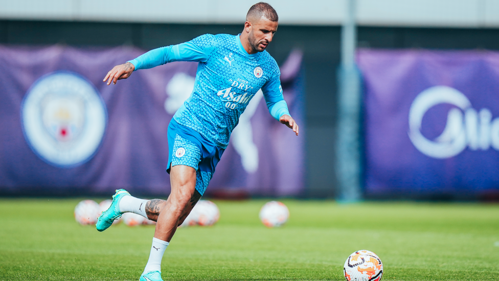PACE : Kyle Walker accelerates with the ball