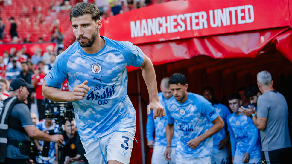 WARM UP : The skipper leads the team out for the pre-match warm up.