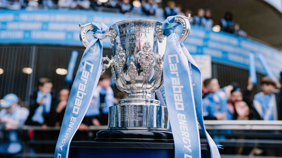 UP FOR ANOTHER CUP : Our Carabao Cup trophy glistens outside the Etihad ahead of our FA Cup quarter-final encounter.