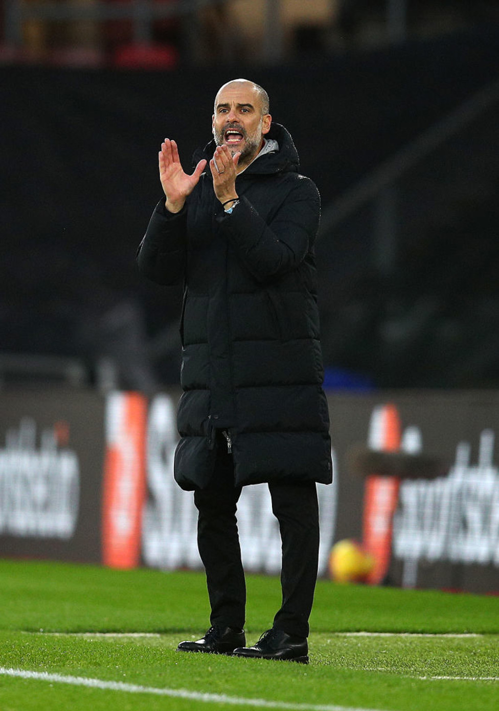 PEP TALK : The boss provides encouragement from the sideline in the second half.