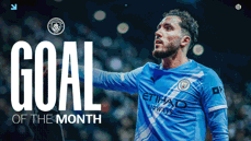 A Manchester City player in a blue home kit celebrates a goal. The image features the text 'Goal of the Month' and includes the Manchester City logo.