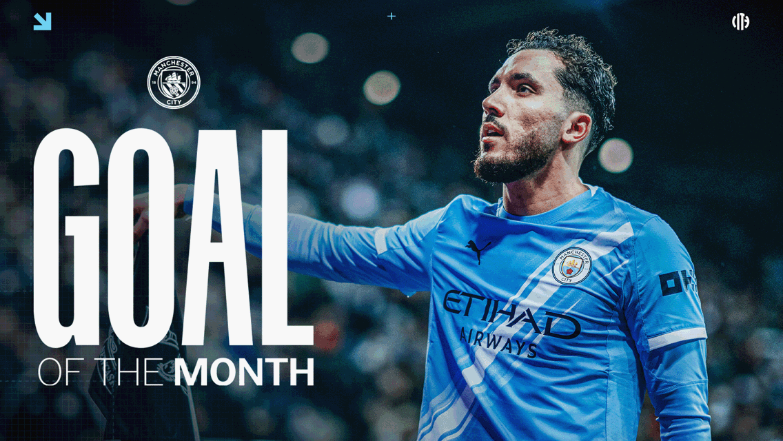 A Manchester City player in a blue home kit celebrates a goal. The image features the text 'Goal of the Month' and includes the Manchester City logo.