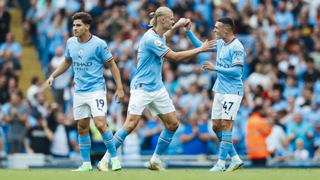 CREATOR AND SCORER: Haaland and Foden celebrate after linking up for the equaliser.