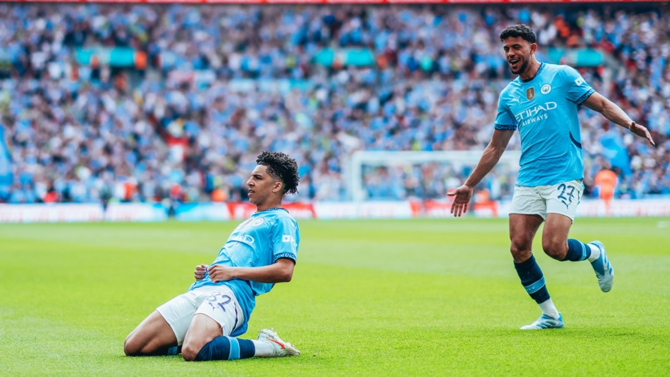 WEMBLEY MAGIC : Lewis with an iconic celebration after his FA Cup semi-final strike against Nottingham Forest.