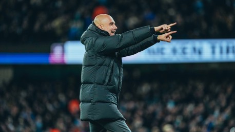 THE BOSS: Celebrates on the touchline.
