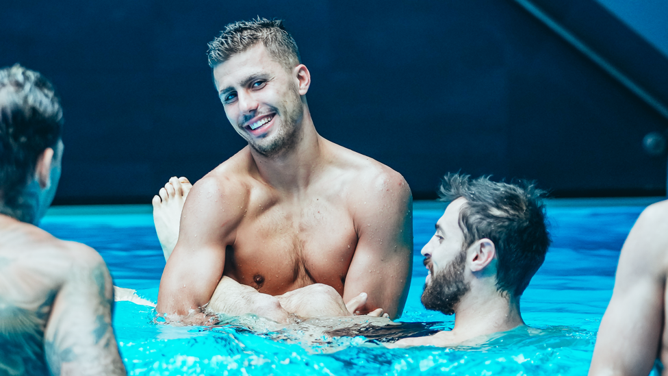 MAKING A SPLASH : Rodrigo spies our camera as he holds Bernardo