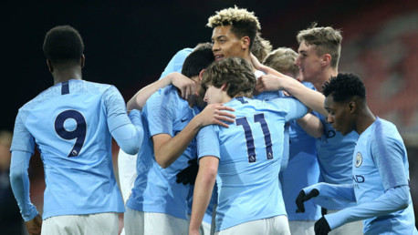 SQUAD: The young Blues celebrate after Felix Nmecha's opener.