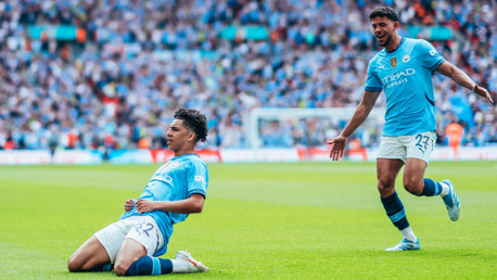 KNEE SLIDE: Lewis enjoyed that!