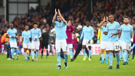 ​UNBEATEN: Kyle Walker is at the forefront as City salute a fantastic away support.