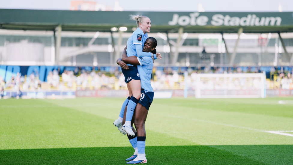 DOUBLE DELIGHT : Shaw and Greenwood celebrating the Jamaican's brace