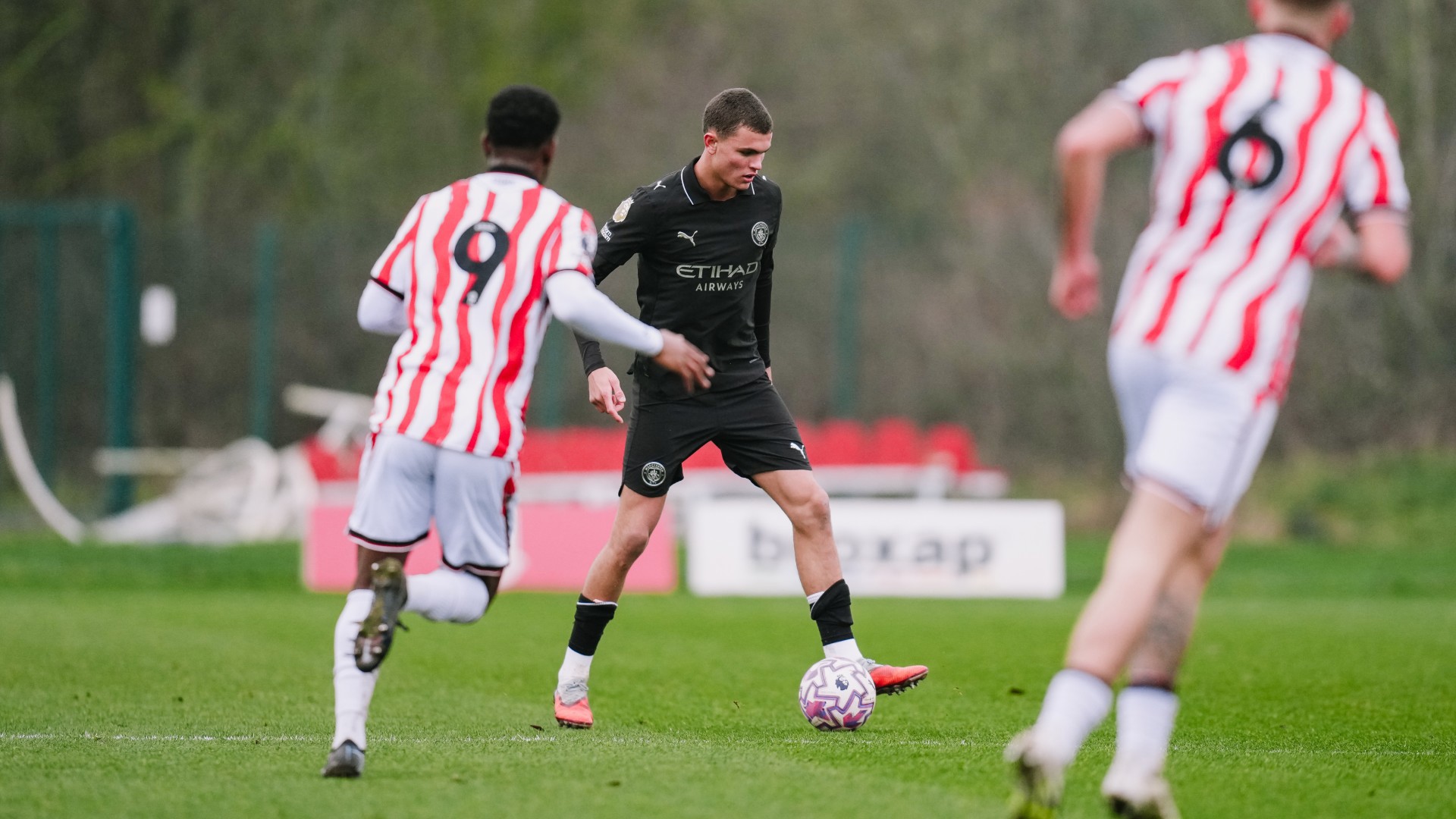 DEFENSIVE DUTIES : Harrison Parker is put under pressure.