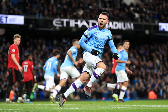 Nicolás Otamendi celebrates scoring against Manchester United