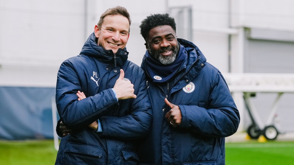 FULL OF SMILES : Pep Lijnders and Kolo Toure spot the camera