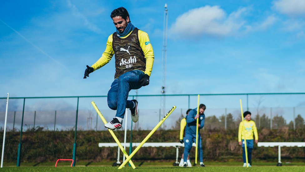 KNEES UP : Ilkay Gundogan gets some air time