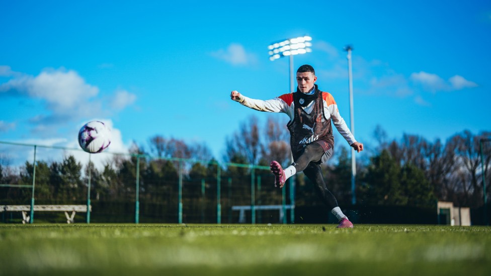 MR BLUE SKY: Phil Foden lets fly.