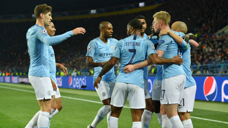 CELEBRATION TIME: The City players salute David Silva after the skipper's brilliant strike