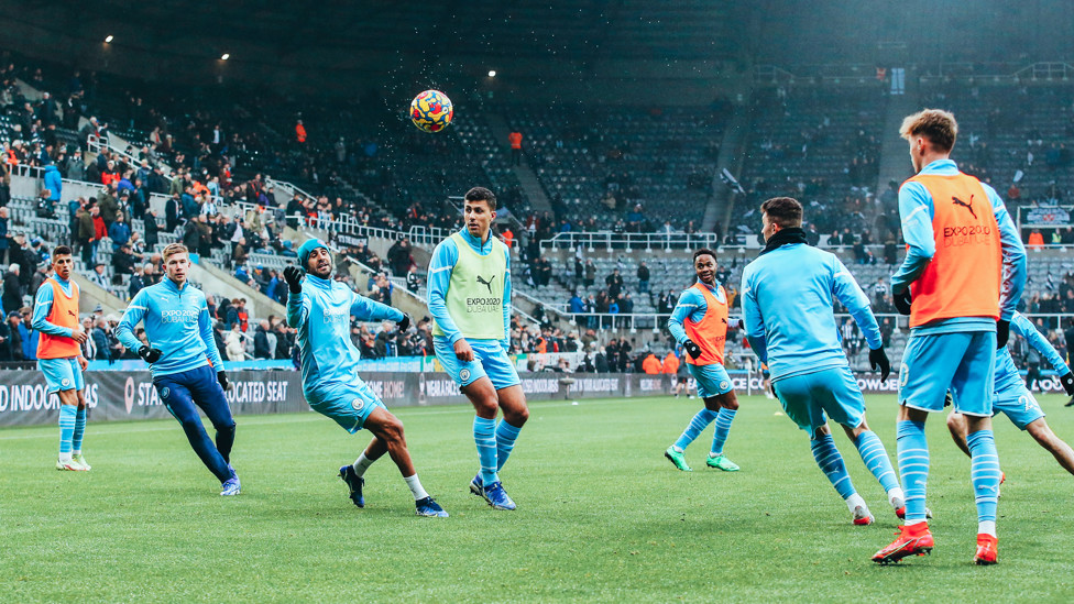 PREP IS THE KEY : The players warm-up in the Tyneside chill. 