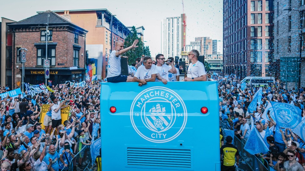BACK OF THE BUS : Pep waves to all the fans