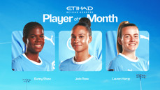 Three Manchester City Women's players are featured for the Etihad Beyond Borders Player of the Month: Bunny Shaw, Jade Rose, and Lauren Hemp. They are in front of a blue background.